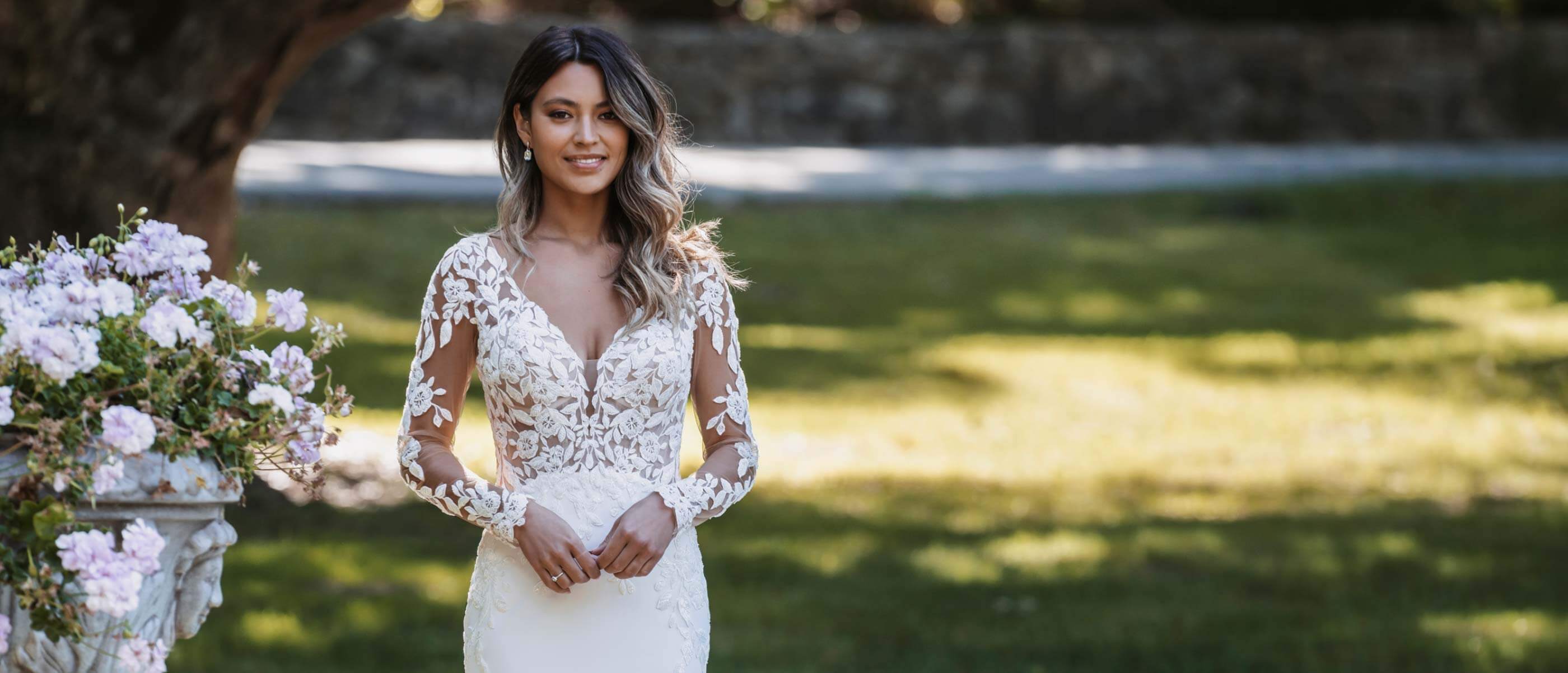 Model wearing a white gown