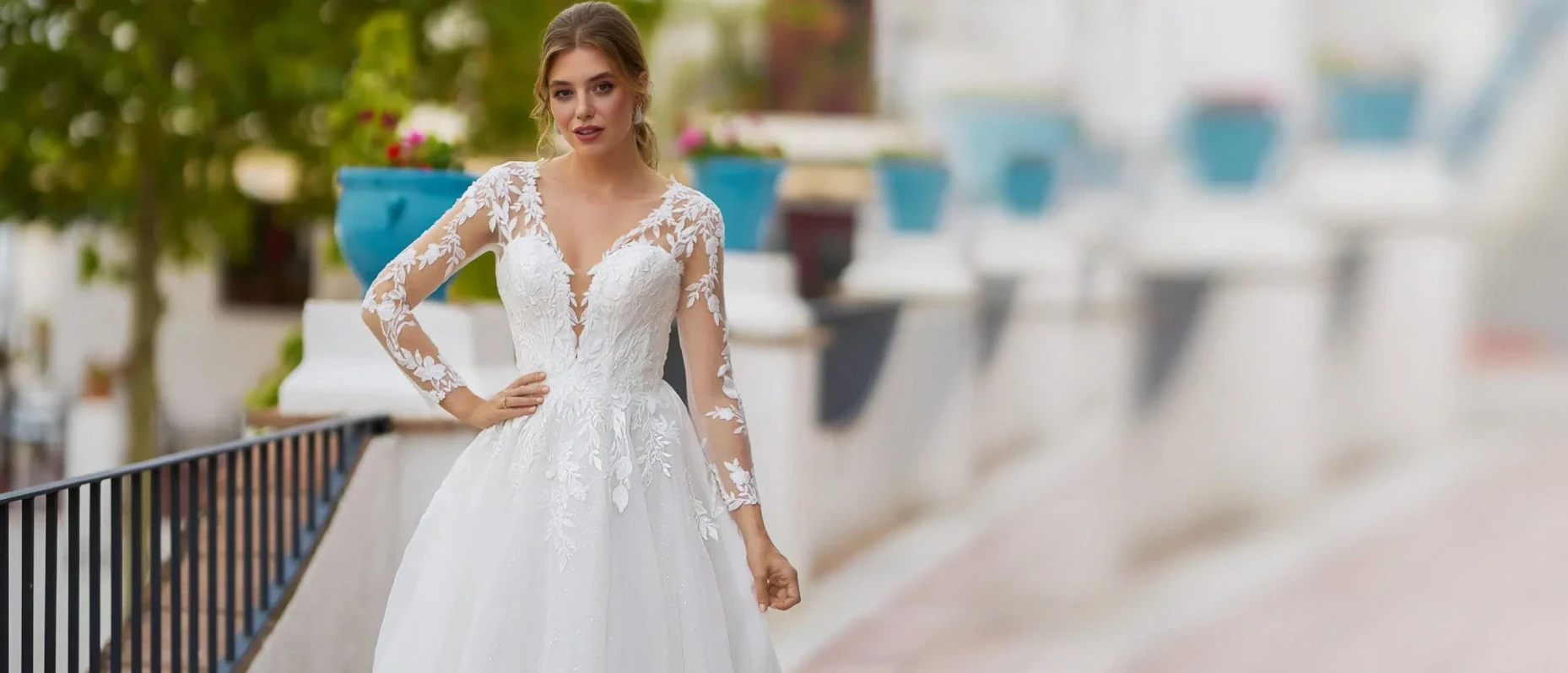 Model wearing a white gown