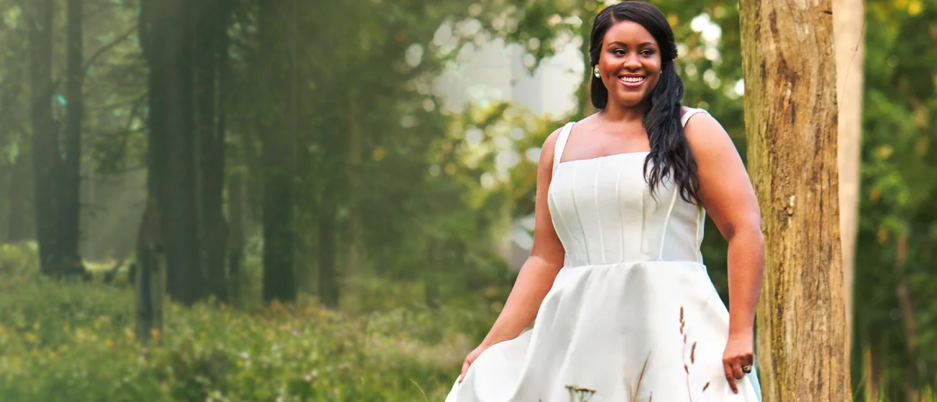 Model wearing a pink gown